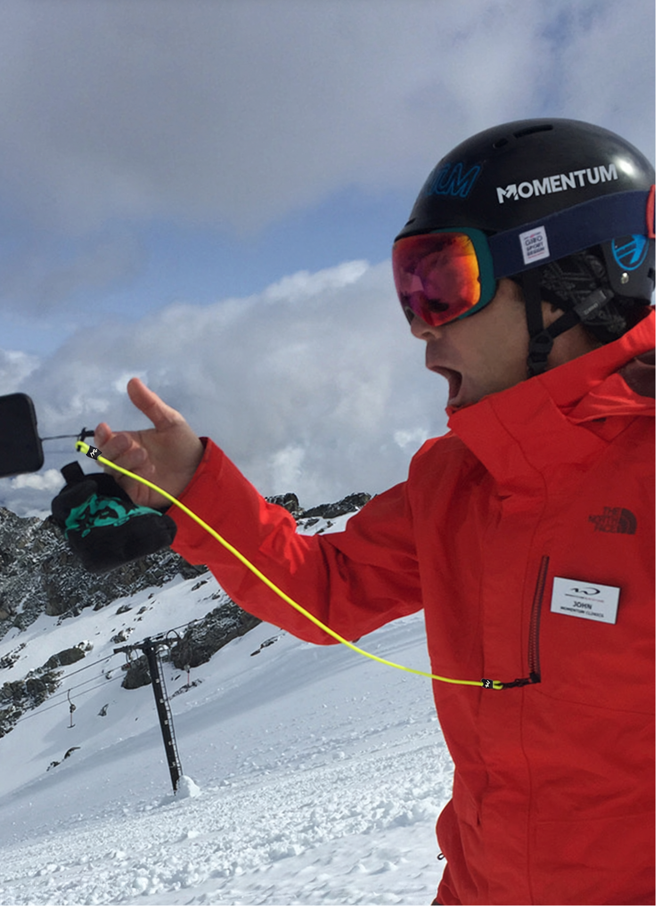 John Smart using an Actionsports Anchor phone tether while skiing in Whistler, British Columbia